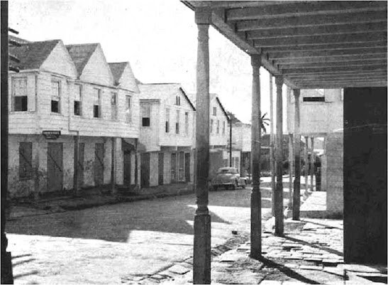 The photo below, from the 1950s, shows the area before it was renovated. In the photo are examples of tri-partite, bi-partite, and gable roofs, as well as brick work.