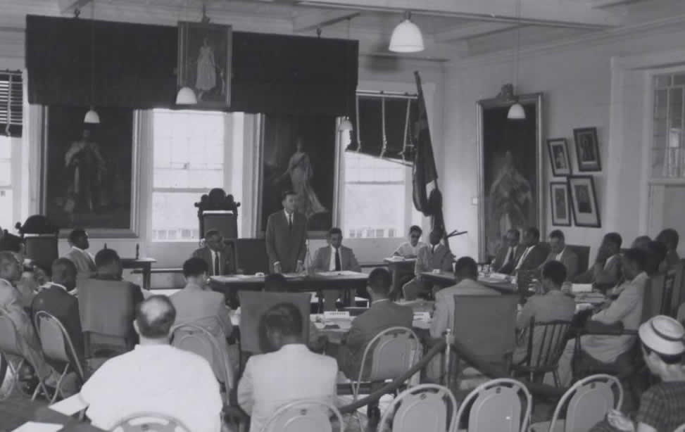 The photo shows a meeting of the Legislative Council in 1961.